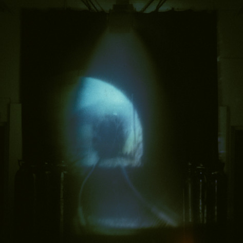 The image first appearing on the surface of the gas